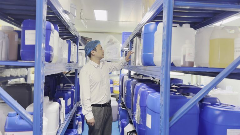 Tyler, founder of jogonglabs, on the production floor