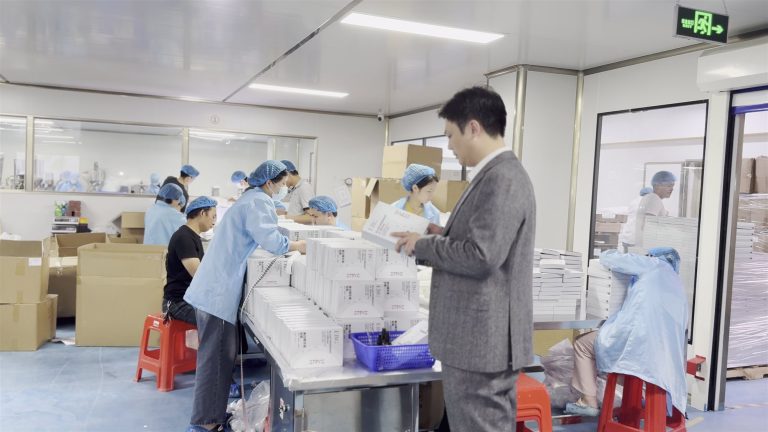 Tyler, founder of jogonglabs, on the production floor