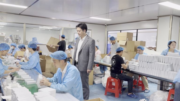Tyler, founder of jogonglabs, on the production floor