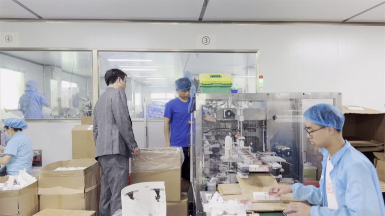 Tyler, founder of jogonglabs, on the production floor