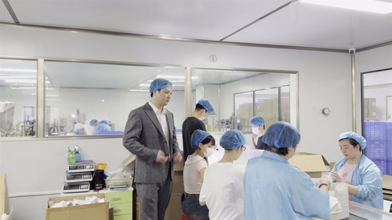 Tyler, founder of jogonglabs, on the production floor