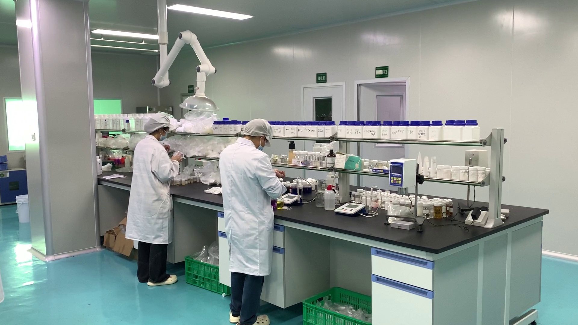Cosmetic chemists working in the laboratory