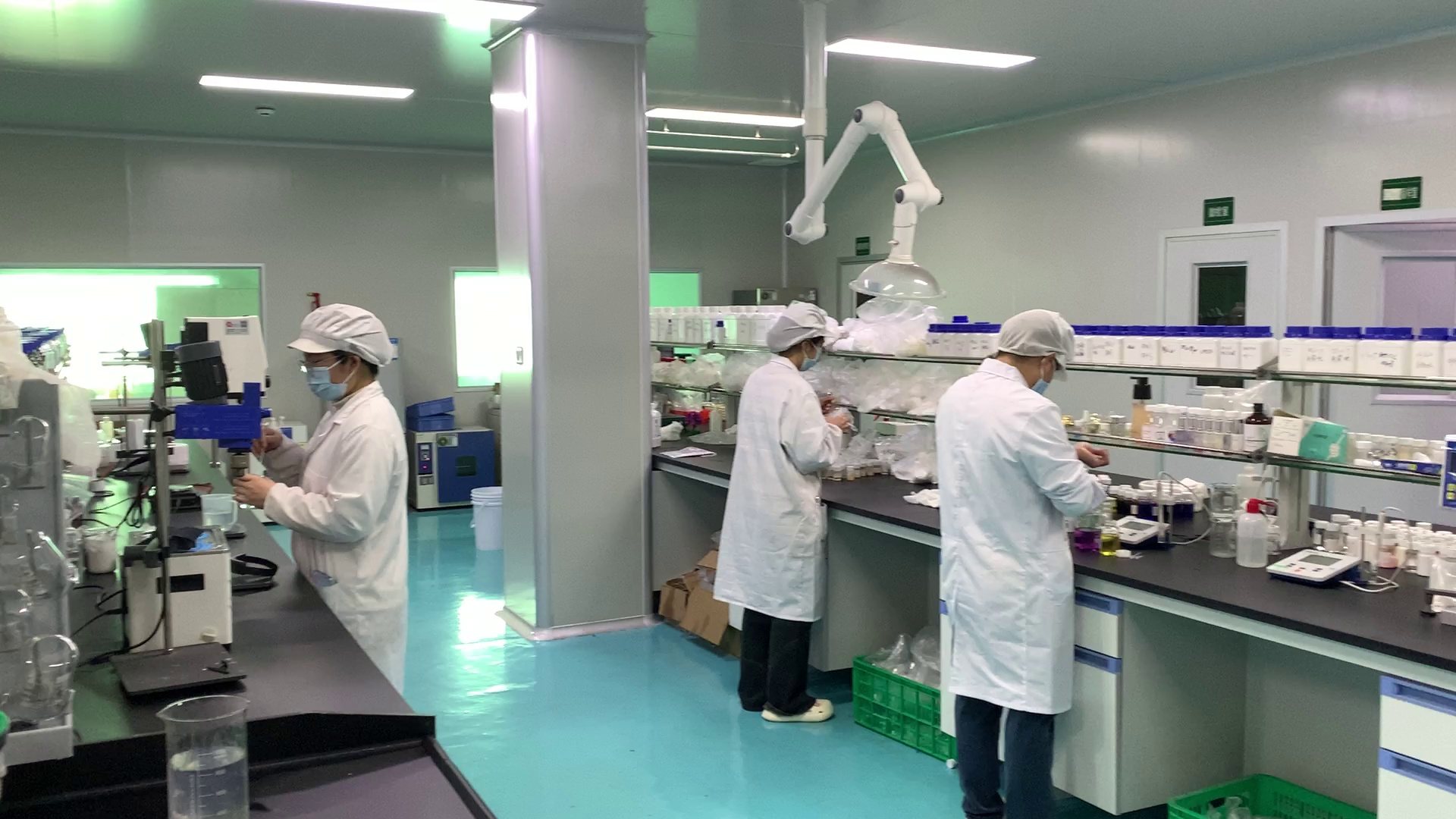 Three technicians running stability and microbiological testing in the jogonglabs laboratory